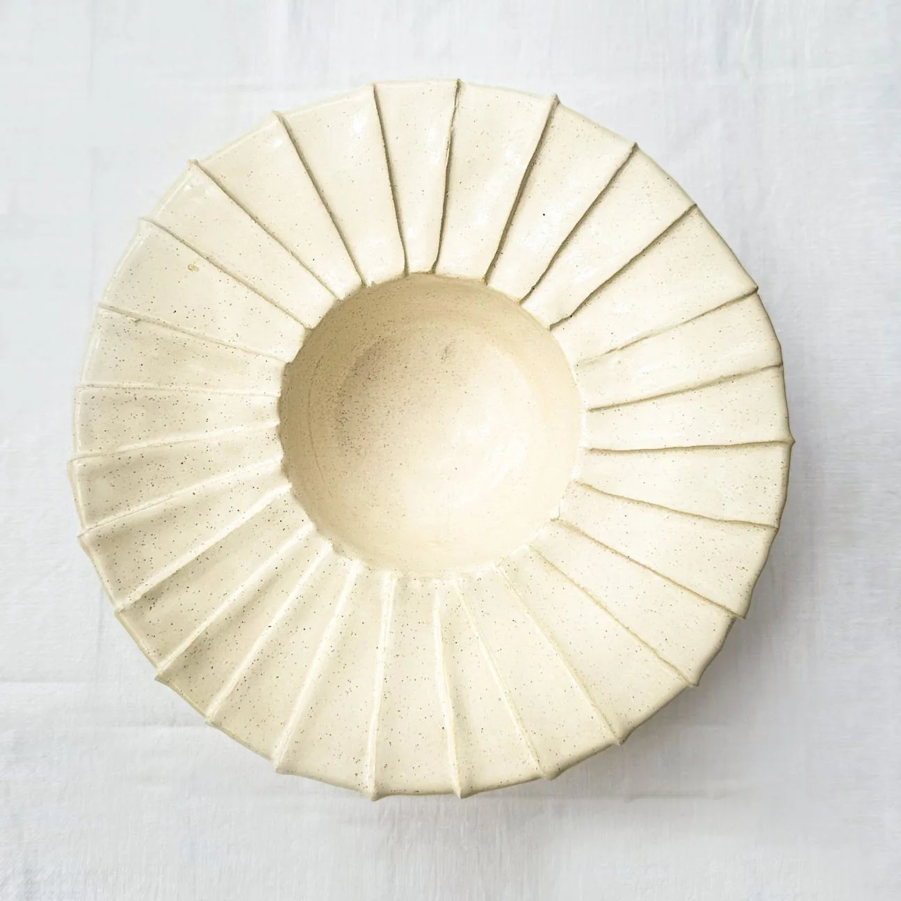 Drapé ceramic plate with broad folds