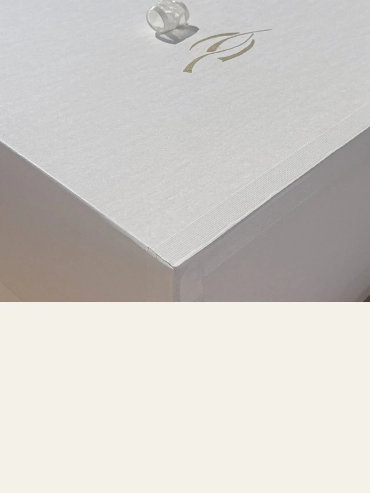 Fabric Senses ceramic piece presented in a restrained white box