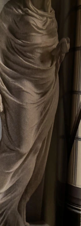 Sculptural drapery in a fashion silhouette